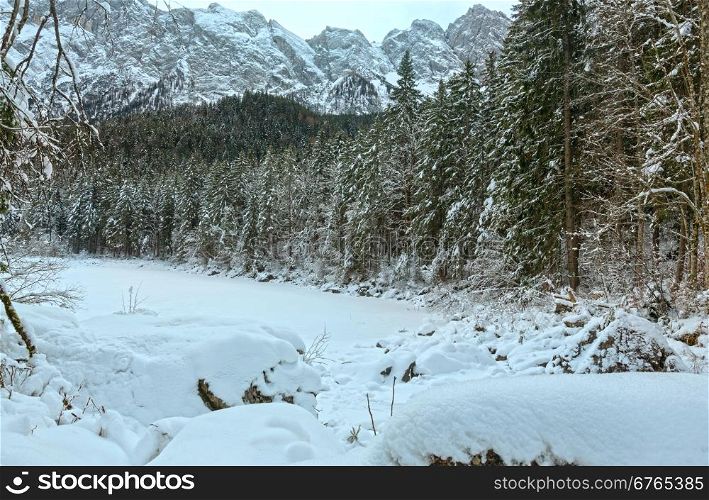 The freeze Frillensee is one of small side of lake Eibsee directly under the Zugspitze. Bavaria, Germany.