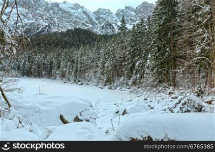 The freeze Frillensee is one of small side of lake Eibsee directly under the Zugspitze. Bavaria, Germany.