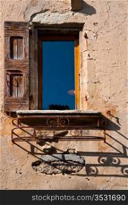 The French Window on the Facade of Old House
