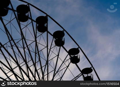 The fun park silhouette with sunset sky