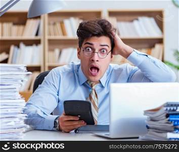 The funny accountant bookkeeper working in the office. Funny accountant bookkeeper working in the office
