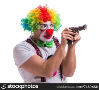 The funny clown with a gun pistol isolated on white background. Funny clown with a gun pistol isolated on white background