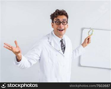 The funny doctor scientist making presentation in hospital. Funny doctor scientist making presentation in hospital