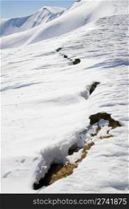 The future danger avalanche signs on spring mountainside (Ukraine, Carpathian Mt&rsquo;s, Svydovets Range, Blyznycja Mount)