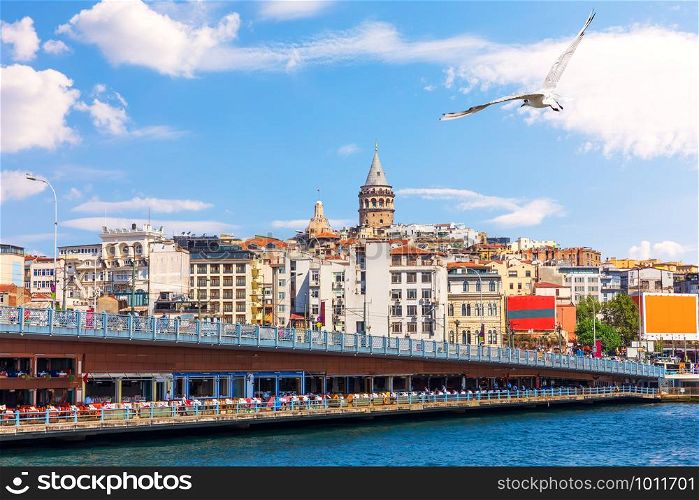 The Galata Bridge and the Galata Tower in Istanbul, Turkey.. The Galata Bridge and the Galata Tower in Istanbul, Turkey