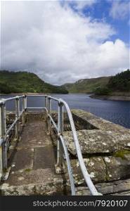 The Garreg-ddu Reservoir, in the mid welsh hills surrounded by hills. Elan Valley, Powys, Wales, United Kingdom, Europe.