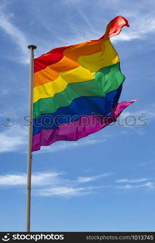 The Gay Pride flag. The colors represent the following. red: life, orange: healing, yellow: sunlight, green: nature, blue: harmony, violet: spirit.