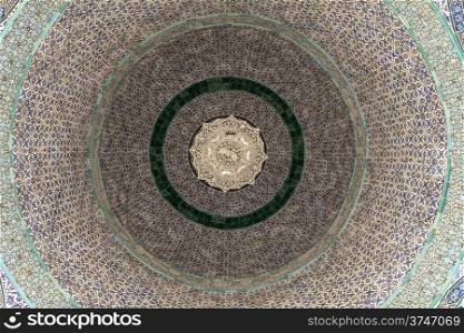 The geometric pattern on the ceiliing of the Dome Of The Chain on the Temple Mount in the Old City of Jerusalem. The center part of the design is a chandelier haning from the center of the dome.
