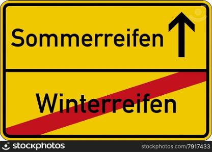 The German words for winter tires and summer tires (Winterreifen and Sommerreifen) on a road sign