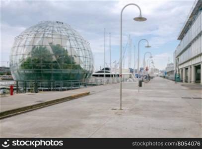 The giant glass sphere biosphere in the seaport of Genoa.