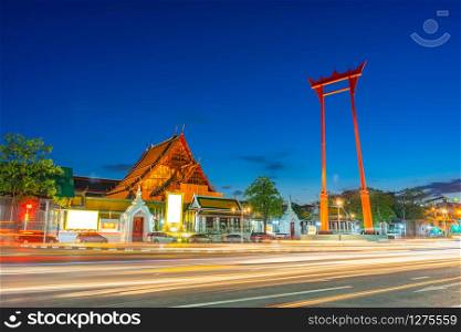 The Giant Swing (Sao Ching Cha) with long exposure light at the evening in Bangkok, Thailand.