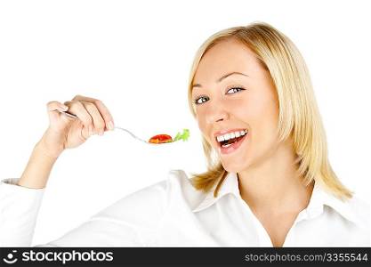 The girl holds a plug with salad at the mouth level, isolated
