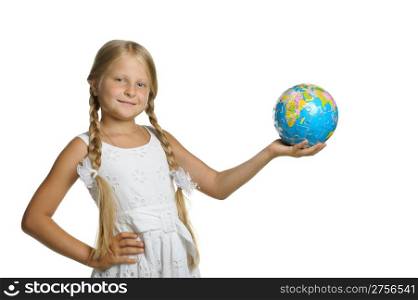 The girl holds the globe collected from puzzle in hands. It is isolated on a white background