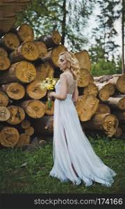 The girl in a white dress.. The girl in a beautiful dress about logs 3198.