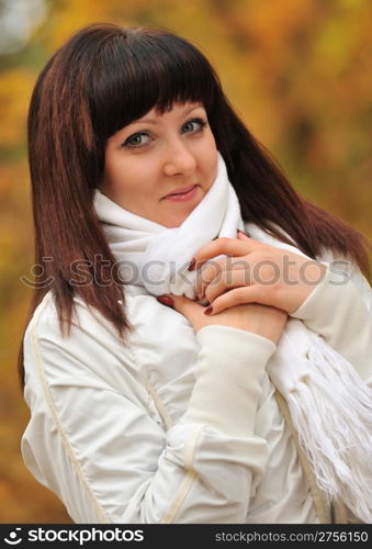 The girl in an autumn forest. The European appearance