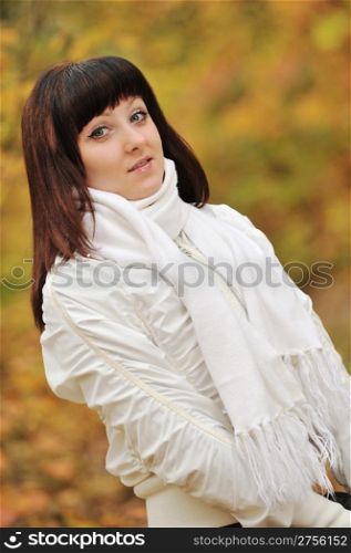 The girl in an autumn forest. The European appearance