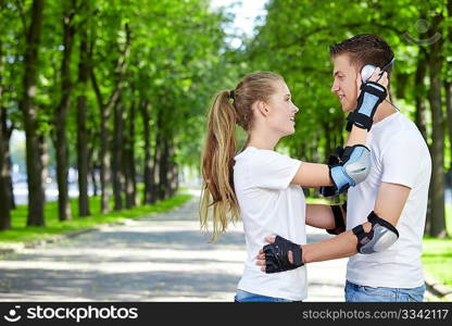 The girl in the outfit of a young boy wearing headphones