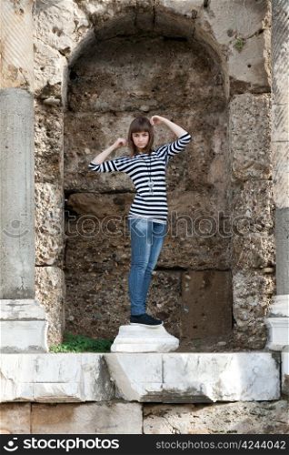 The girl in the ruins of the statue depicts