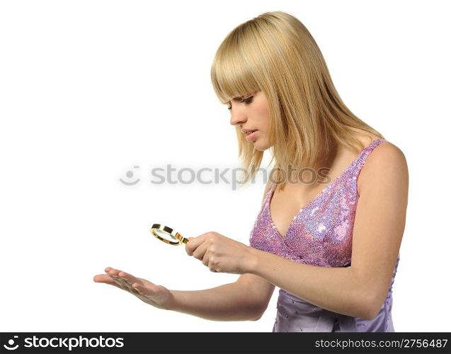 The girl looking at a hand through a magnifier. It is isolated on a white background