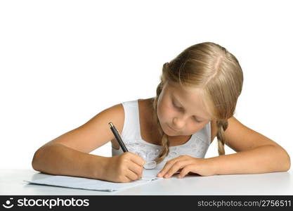 The girl writes to writing-books. The decision of lessons. It is isolated on a white background