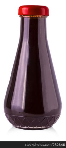 The glass bottle with dark sauce on a white background