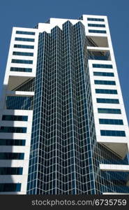 The glass facade of an inner-city building, Sydney, Australia