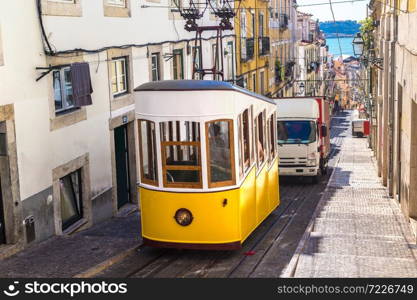 The Gloria Funicular in the city center of Lisbon in a beautiful summer day, Portugal