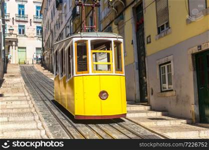 The Gloria Funicular in the city center of Lisbon in a beautiful summer day, Portugal