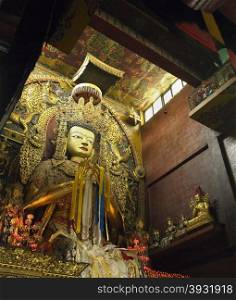 The golden Buddha in Bouddhanath (or Baudhanath) Monastery in Kathmandu in Nepal. It is a UNESCO World Heritage Site.