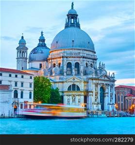 The Grand Canal and Santa Maria della Salute church in Venice in the evening, Italy