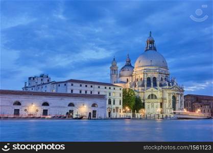 The Grand Canal with Santa Maria della Salute church in Venice at twilight, Italy