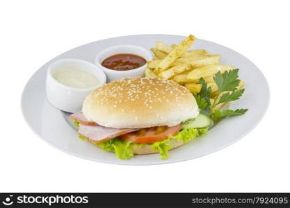 The great hamburger with potato and sauce on an isolated background. The hamburger with potato and sauce