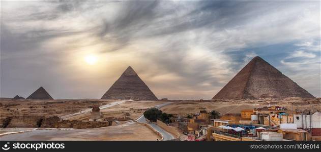 The Great Pyramids of Giza, panoramic view from the town.. The Great Pyramids of Giza, panoramic view from the town