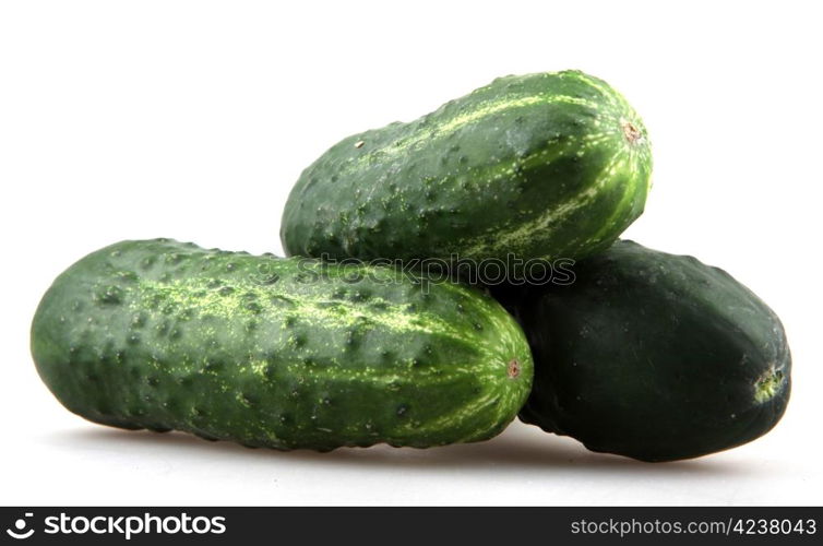 The green cucumbers isolated on white background.