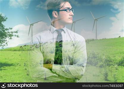 The green energy anc ecology concept with businessman. Green energy anc ecology concept with businessman