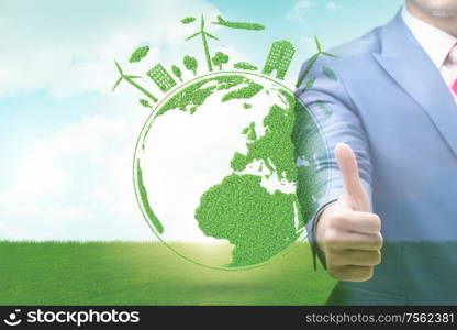 The green energy anc ecology concept with businessman. Green energy anc ecology concept with businessman