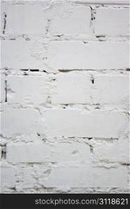 The grunge white brick wall for backgroun