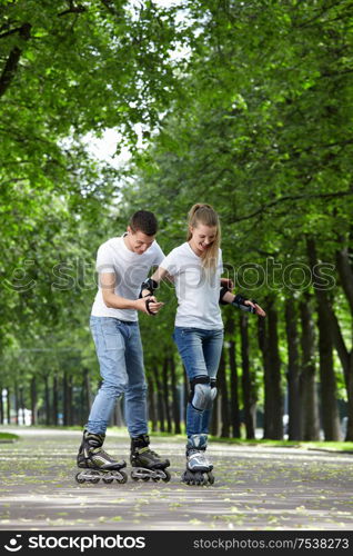 The guy and the girl go for a drive on rollers