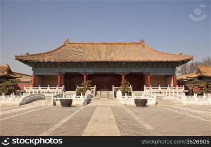 The Halberd Gate is part of the People&rsquo;s Cultural Palace (previously the Taimiao Ancestral Temple) in Beijing. This traditional Chinese building, with the low bridges in front of it that cross a smal pond, was the gate to the main courtyard of the complex.