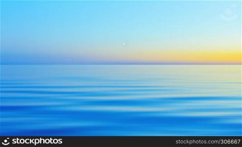 The half moon in a clear blue sky after yellow sunset over a calm flowing water surface in the White Nights season. Abstract motion blurred background of a beautiful evening seascape with space for copy and design.