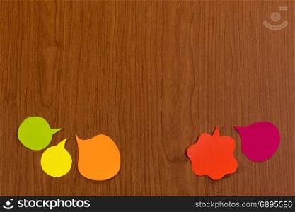 The Handmade Colorful Origami Balloons on the Wooden Background