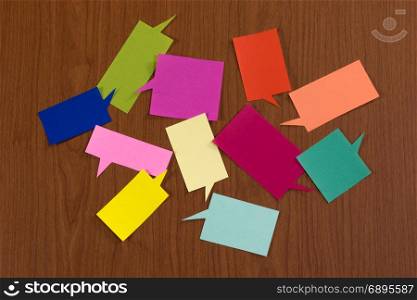 The Handmade Colorful Origami Balloons on the Wooden Background