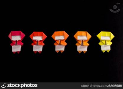 The Handmade Origami Ninja Kids on the Black Background
