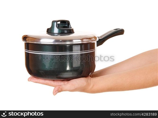 The hands of a woman holding a green cooking pot, isolated for whitebackground.