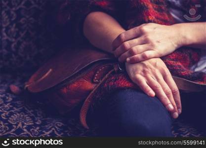 The hands of a young woman