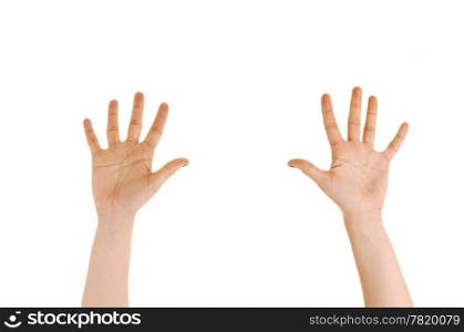 The hands of a young woman reaching high with the palms to thecamera on white background.