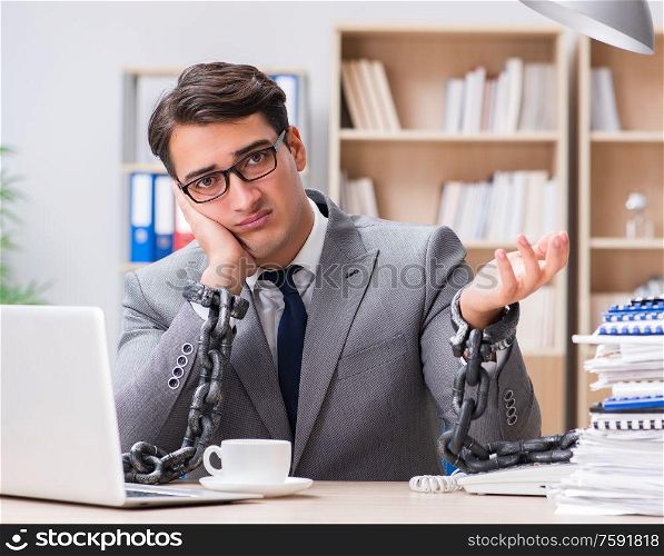 The handsome businessman working in the office. Handsome businessman working in the office