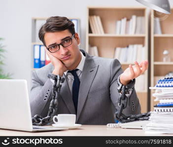 The handsome businessman working in the office. Handsome businessman working in the office