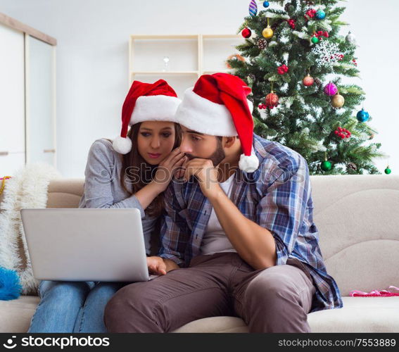 The happy couple celebrating christmas holiday. Happy couple celebrating christmas holiday