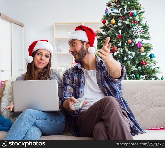 The happy couple celebrating christmas holiday. Happy couple celebrating christmas holiday
